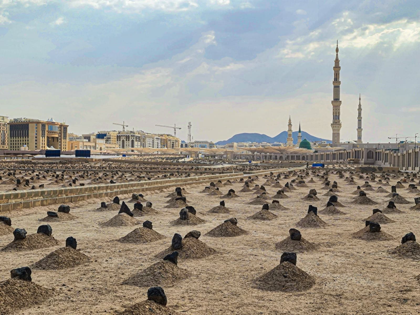 Al-Baqi Cemetery with the Prophet's Mosque and Green Dome in the background